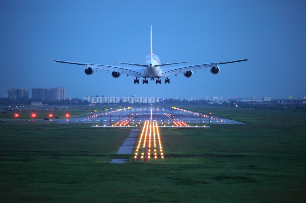 Airplane landing on a runway