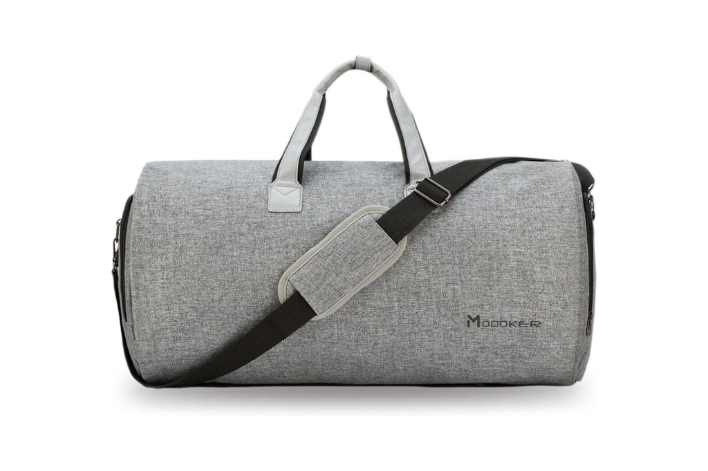 A gray duffel bag with black straps